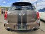 2011 BROWN Mini Cooper S ALL4 COUNTRYMAN (WMWZC5C59BW) with an 1.6L L4 DOHC 16V TURBO engine, AUTO transmission, located at 2660 S.Garland Avenue, Garland, TX, 75041, (469) 298-3118, 32.885387, -96.656776 - Photo#4