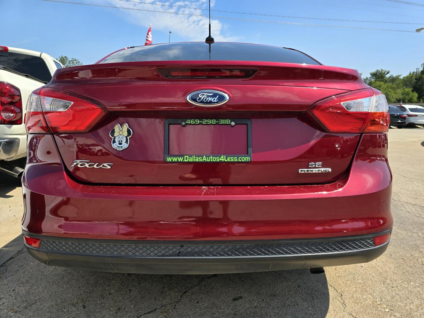 2014 RED /BEIGE FORD FOCUS SE SE (1FADP3F24EL) , AUTO transmission, located at 2660 S.Garland Avenue, Garland, TX, 75041, (469) 298-3118, 32.885387, -96.656776 - Welcome to DallasAutos4Less, one of the Premier BUY HERE PAY HERE Dealers in the North Dallas Area. We specialize in financing to people with NO CREDIT or BAD CREDIT. We need proof of income, proof of residence, and a ID. Come buy your new car from us today!! This is a Very clean 2014 FORD FOCUS - Photo#4