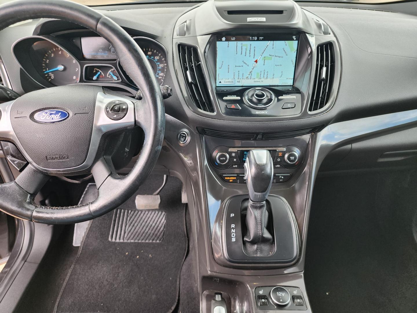 2016 GRAY /BLACK Ford Escape Titanium (1FMCU0J97GU) with an 2.0L L4 DOHC 16V engine, 6-Speed Automatic transmission, located at 2660 S.Garland Avenue	, Garland, TX, 75041, (469) 298-3118, 32.885387, -96.656776 - CASH$$$$$$$$ ESCAPE TITANIUM!! This is a Super Clean 2016 FORD ESCAPE TITANIUM SUV! PUSH START! NAVIGATION! BACK UP CAMERA! PANO ROOF! HEATED/LEATHER SEATS! BLUETOOTH! SAT RADIO! SUPER CLEAN! MUST SEE! Come in for a test drive today. We are open from 10am-7pm Monday-Saturday. Call us with any - Photo#14