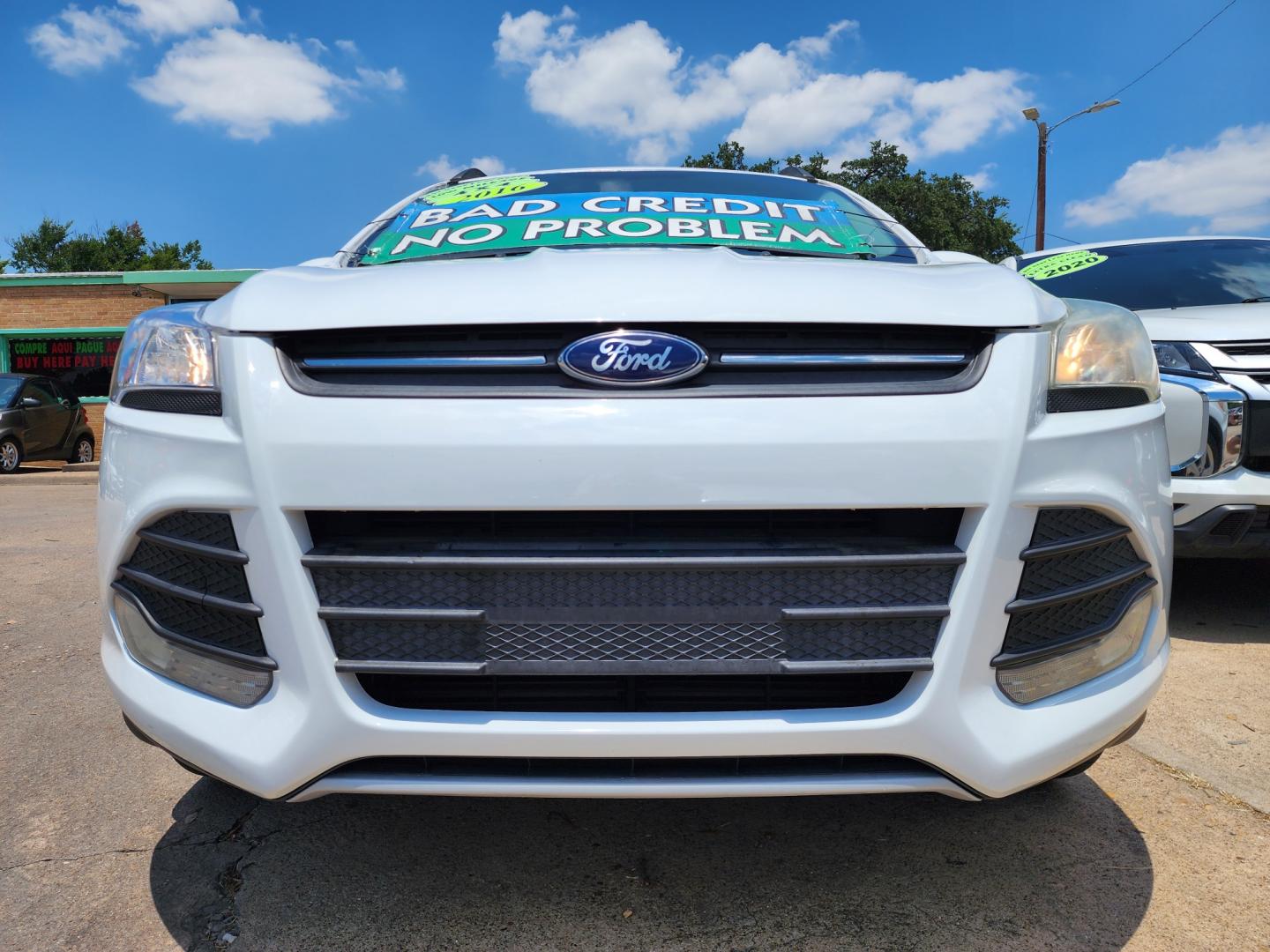 2016 WHITE Ford Escape SE (1FMCU9GX0GU) with an 1.6L L4 DOHC 16V engine, 6-Speed Automatic transmission, located at 2660 S.Garland Avenue, Garland, TX, 75041, (469) 298-3118, 32.885387, -96.656776 - Welcome to DallasAutos4Less, one of the Premier BUY HERE PAY HERE Dealers in the North Dallas Area. We specialize in financing to people with NO CREDIT or BAD CREDIT. We need proof of income, proof of residence, and a ID. Come buy your new car from us today!! This is a Super Clean 2016 FORD ESCAP - Photo#9