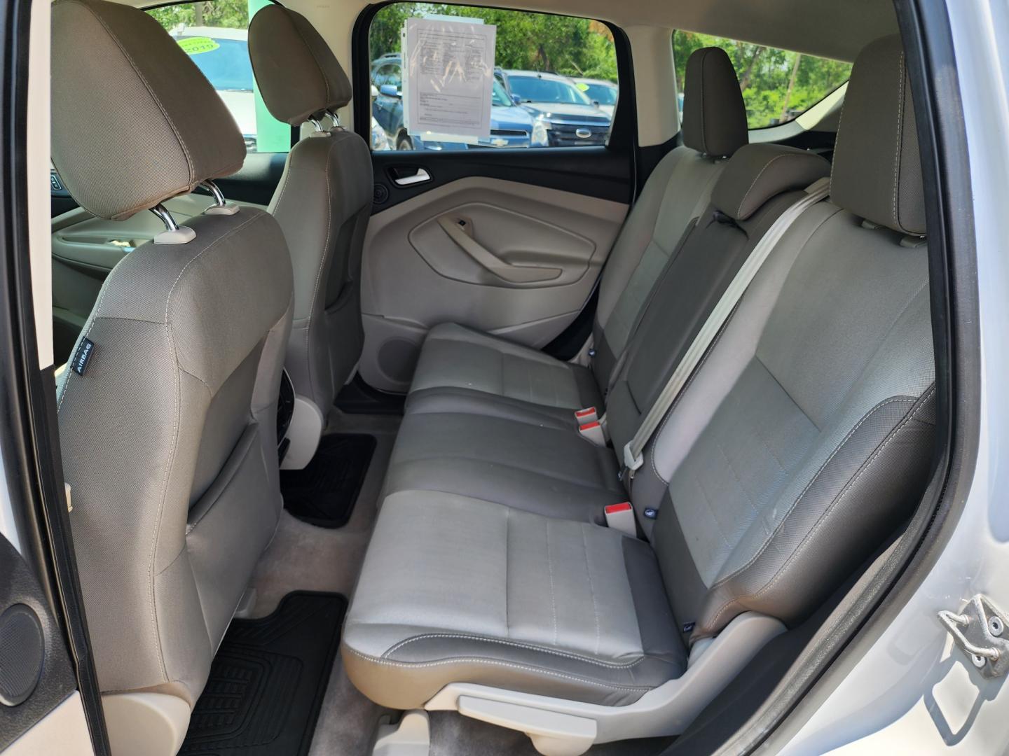 2016 WHITE Ford Escape SE (1FMCU9GX0GU) with an 1.6L L4 DOHC 16V engine, 6-Speed Automatic transmission, located at 2660 S.Garland Avenue, Garland, TX, 75041, (469) 298-3118, 32.885387, -96.656776 - Welcome to DallasAutos4Less, one of the Premier BUY HERE PAY HERE Dealers in the North Dallas Area. We specialize in financing to people with NO CREDIT or BAD CREDIT. We need proof of income, proof of residence, and a ID. Come buy your new car from us today!! This is a Super Clean 2016 FORD ESCAP - Photo#15