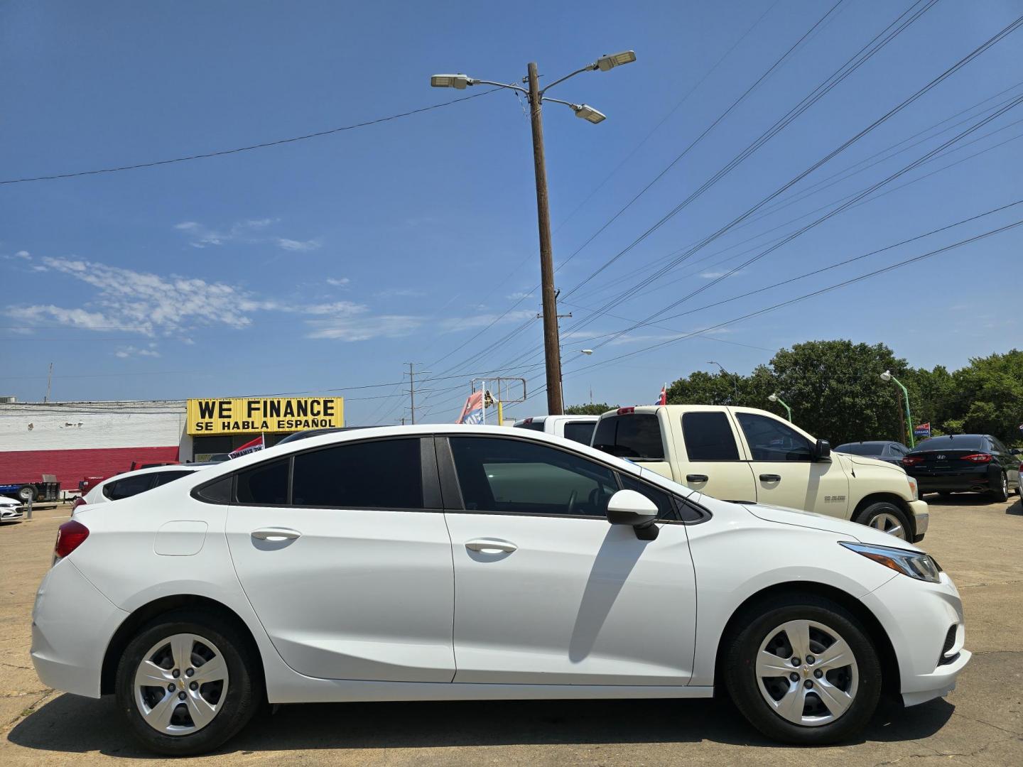 2017 Chevrolet Cruze LS (1G1BC5SM1H7) with an 1.4L L4 DOHC 16V TURBO engine, 6A transmission, located at 2660 S.Garland Avenue, Garland, TX, 75041, (469) 298-3118, 32.885387, -96.656776 - Welcome to DallasAutos4Less, one of the Premier BUY HERE PAY HERE Dealers in the North Dallas Area. We specialize in financing to people with NO CREDIT or BAD CREDIT. We need proof of income, proof of residence, and a ID. Come buy your new car from us today!! This is a very well cared for 2017 CH - Photo#2