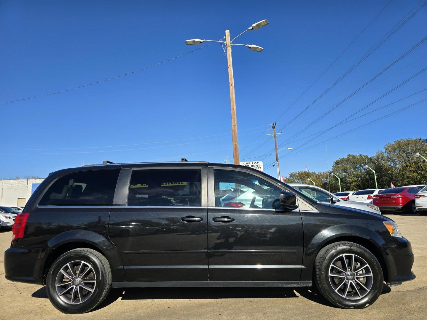 2017 BLACK Dodge Grand Caravan SXT (2C4RDGCG2HR) with an 3.6L V6 DOHC 24V engine, 6A transmission, located at 2660 S.Garland Avenue, Garland, TX, 75041, (469) 298-3118, 32.885387, -96.656776 - Photo#2