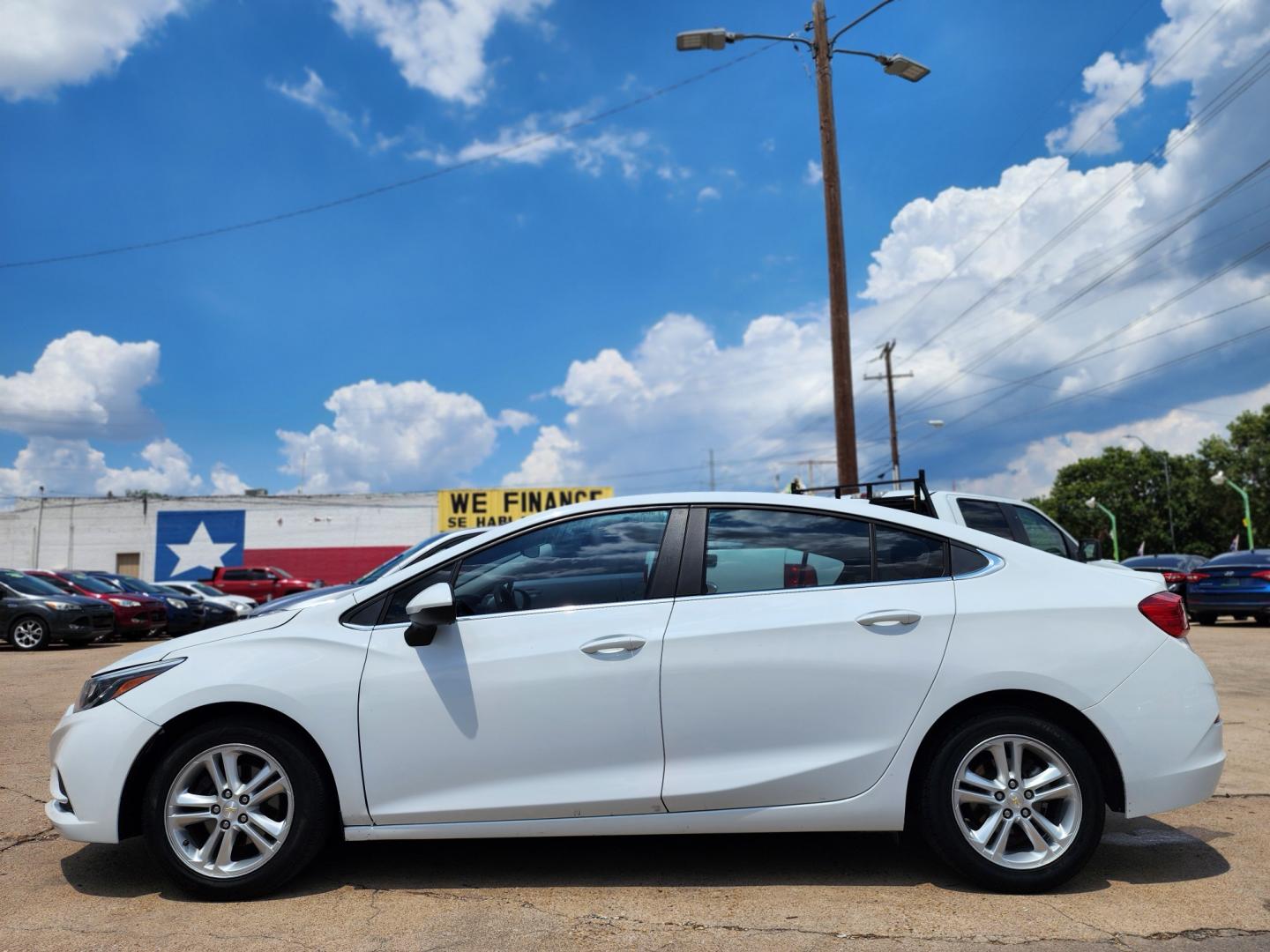 2018 WHITE Chevrolet Cruze LT (1G1BE5SM6J7) , AUTO transmission, located at 2660 S.Garland Avenue	, Garland, TX, 75041, (469) 298-3118, 32.885387, -96.656776 - CASH$$$$$$ CAR!! This is a very well cared for 2018 CHEVY CRUZE LT SEDAN! BACK UP CAMERA! HEATED SEATS! BLUETOOTH! XM SAT RADIO! Come in for a test drive today. We are open from 10am-7pm Monday-Saturday. Call us with any questions at 469-202-7468, or email us DallasAutos4Less@gmail.com. - Photo#6