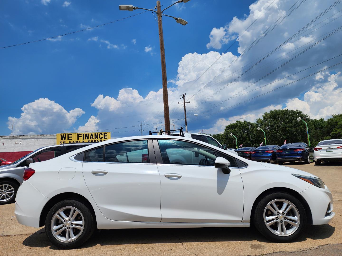 2018 WHITE Chevrolet Cruze LT (1G1BE5SM6J7) , AUTO transmission, located at 2660 S.Garland Avenue	, Garland, TX, 75041, (469) 298-3118, 32.885387, -96.656776 - CASH$$$$$$ CAR!! This is a very well cared for 2018 CHEVY CRUZE LT SEDAN! BACK UP CAMERA! HEATED SEATS! BLUETOOTH! XM SAT RADIO! Come in for a test drive today. We are open from 10am-7pm Monday-Saturday. Call us with any questions at 469-202-7468, or email us DallasAutos4Less@gmail.com. - Photo#2