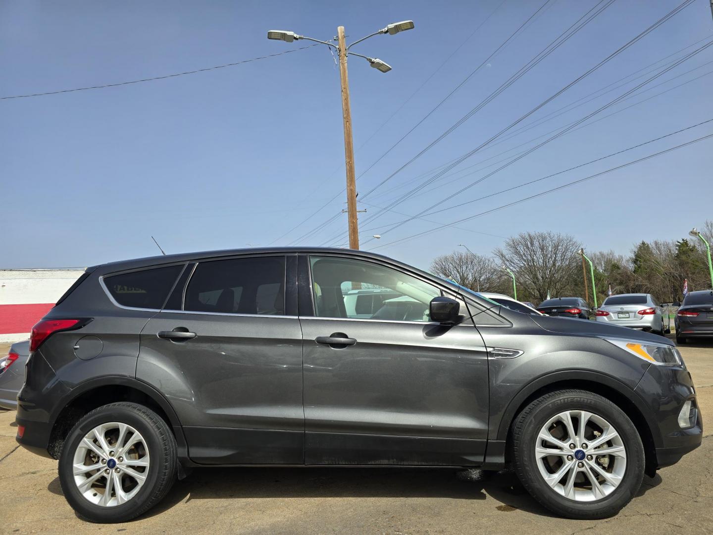 2019 GRAY Ford Escape SE (1FMCU0G9XKU) with an 2.0L L4 DOHC 16V engine, 6A transmission, located at 2660 S.Garland Avenue, Garland, TX, 75041, (469) 298-3118, 32.885387, -96.656776 - Photo#2